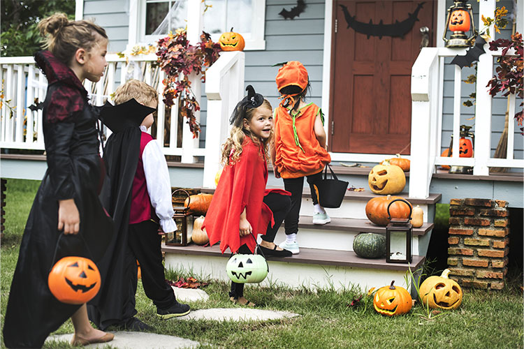 Kids Trick-or-Treating in Halloween Costumes