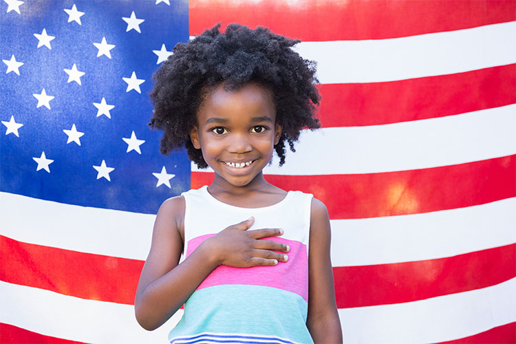 Girl in front of american flag