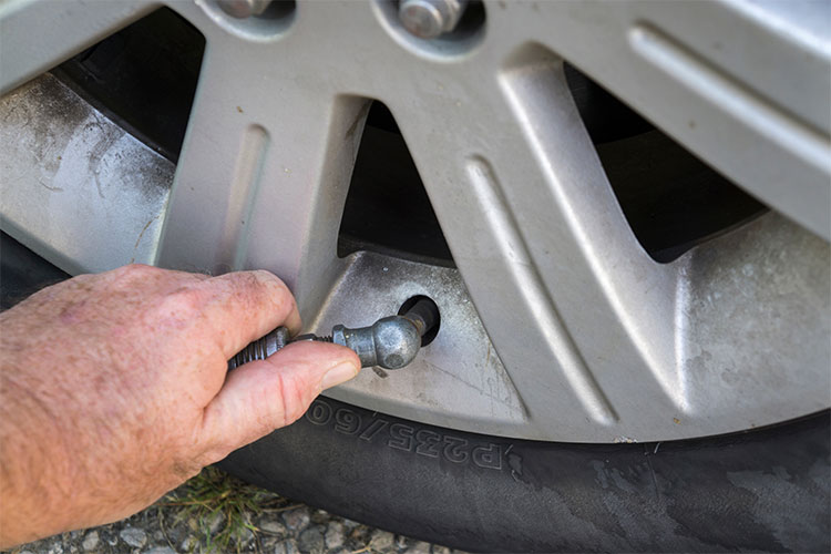 Checking the tire pressure on your car