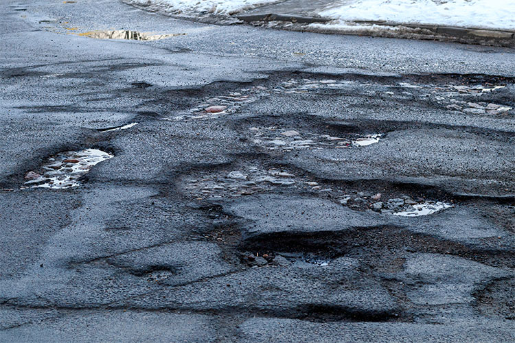 Potholes on the road