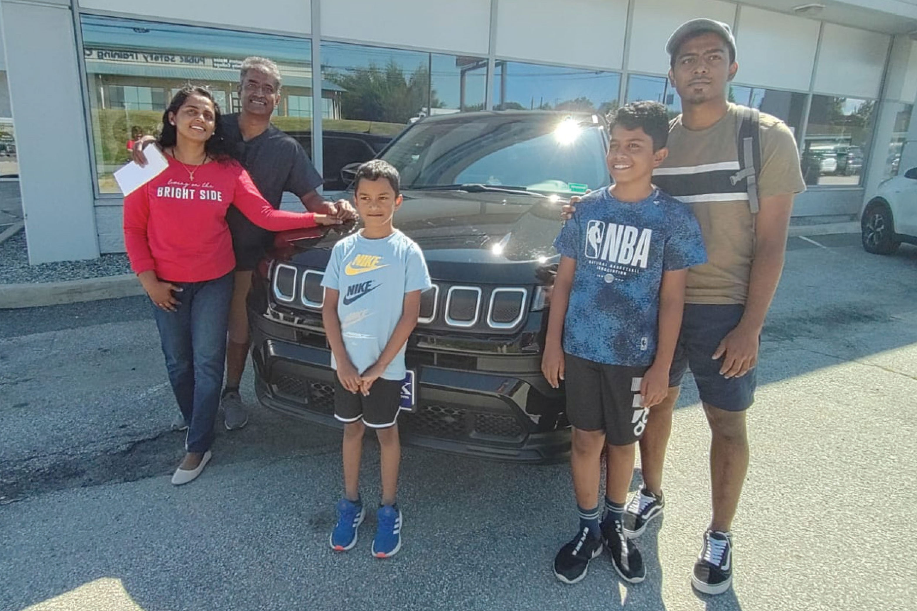 The Philip family and their new Jeep Compass